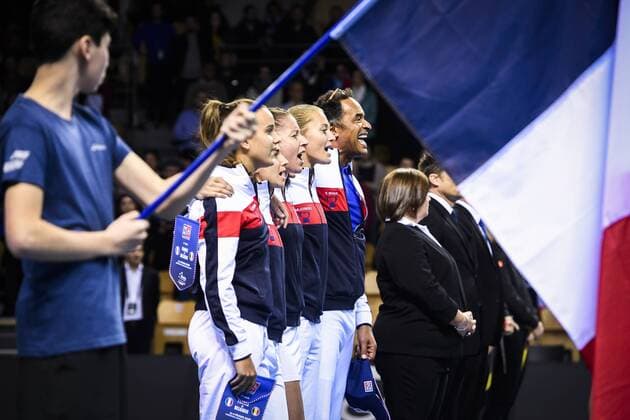 French Clara Burel, French Amandine Hesse, French Pauline Parmentier, French Kristina Mladenovic and French Davis Cup captain Yannick Noah sing at the national anthem at the presentation ahead of the first game of this weekend s Fed Cup World Group Round 1 meeting between France and Belgium in La Roche-sur-Yon, France, Saturday 10 February 2018. LAURIExDIEFFEMBACQ  x05293528x