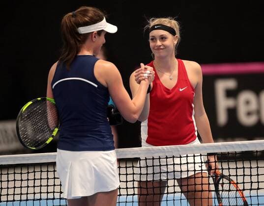 TENNIS - ITF Fed Cup TALLINN,ESTONIA,10.FEB.18 - TENNIS - ITF Fed Cup. Image shows Johanna Konta (GBR) and Fanni Stollar (HUN). GEPAxpictures xWalterxLuger