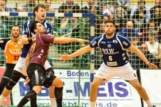 Savvas Savvas 77 Eintracht Hildesheim is stopped by Csaba Szücs 20 Bergischer HC and Leos Petrovsky 6 Bergischer HC Bergischer HC vs Eintracht Hildesheim 2 handball Bundesliga 10 02 18 Solingen, North Rhine-Westphalia Germany blades Hall Copyright: xcdnx