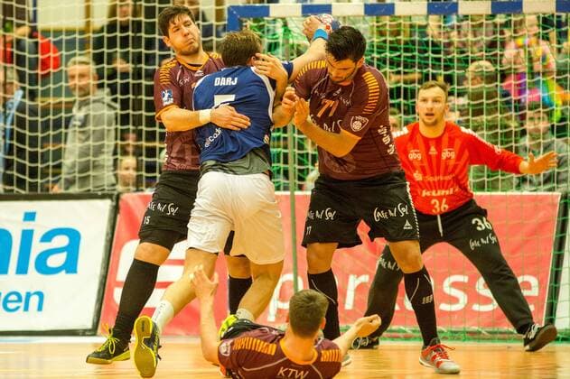 Max Darj 5 Bergischer HC is stopped by Chris Meiser 15 Eintracht Hildesheim and Savvas Savvas 77 Eintracht Hildesheim of Bergischer HC vs Eintracht Hildesheim 2 handball Bundesliga 10 02 18 Solingen, North Rhine-Westphalia Germany blades Hall Copyright: xcdnx