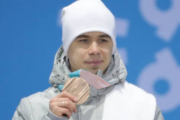 PYEONGCHANG, SOUTH KOREA â€“ FEBRUARY 11, 2018: Short track speed skater Semyon Yelistratov, Olympic Athlete from Russia, poses with his bronze medal at the victory ceremony for the for men s 1500m short track Speed skating Eisschnelllauf event at the 2018 Winter Olympic Games Olympische Spiele Olympia OS at Medals Plaza. Sergei Bobylev TASS  TS0734AF