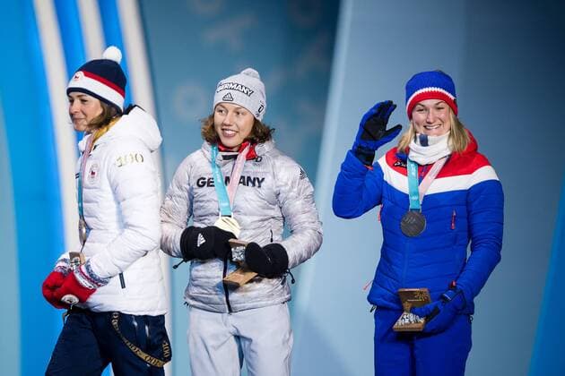 180211 Marte Olsbu of Norway Silver Laura Dahlmeier of Germany Gold and Veronika Vitkova of Czech Republic Bronze at the medal ceremony for the Women s 4 X 5 km relay during day two of the 2018 Winter Olympics on February 11 2018 in Pyeongchang Photo Jon Olav Nesvold BILDBYRAN code JE 160153  Copyright: JONxOLAVxNESVOLD BB180211BB203