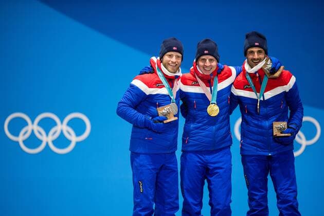 180211 Martin Johnsrud Sundby Silver Simen Hegstad Krüger Gold and Hans Christer Holund Bronze of Norway celebrates at the medal ceremony for the Men s 30 km pursuit during day two of the 2018 Winter Olympics on February 11 2018 in Pyeongchang Photo Jon Olav Nesvold BILDBYRAN code JE 160153  Copyright: JONxOLAVxNESVOLD BB180211BB208