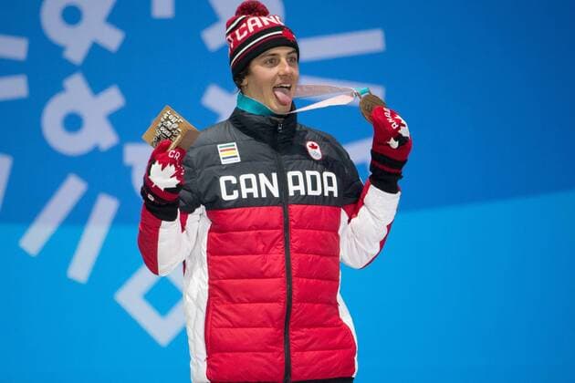 MenÕs snowboard slopestyle bronze medalist Mark McMorris of Canada celebrates on the podium during a medal ceremony for the Pyeongchang 2018 Winter Olympics, at the Olympic Medal Plaza in Daegwalnyeong, South Korea, on February 11, 2018.  OLY20180211140 MATTHEWxHEALEY