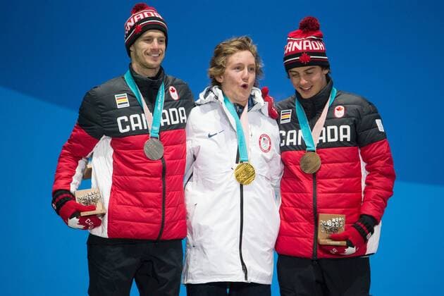 From left menÕs snowboard slopestyle silver medalist Max Parrot of Canada, gold medalist Redmond Gerard of the United States and bronze medalist Mark McMorris of Canada pose for a photo on the podium during a medal ceremony for the Pyeongchang 2018 Winter Olympics, at the Olympic Medal Plaza in Daegwalnyeong, South Korea, on February 11, 2018.  OLY20180211146 MATTHEWxHEALEY