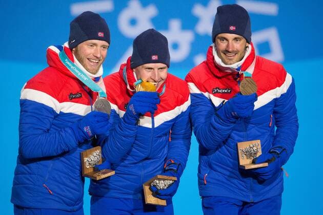 From left menÕs cross-country skiing 15km + 15km skiathalon silver medalist Martin Johnsrud Sundby, gold medalist Simen Heisted Krueger, and bronze medalist Hans Christer Holund all of Norway pose for a photo during a medal ceremony for the Pyeongchang 2018 Winter Olympics, at the Olympic Medal Plaza in Daegwalnyeong, South Korea, on February 11, 2018.  OLY20180211151 MATTHEWxHEALEY