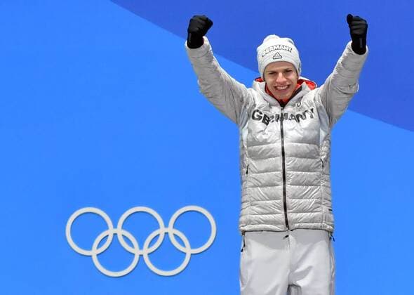 (180211) -- PYEONGCHANG, Feb. 11, 2018 -- Champion Andreas Wellinger of Germany celebrates during the medal ceremony of men s normal hill individual event of Ski jumping Skispringen Ski nordisch at 2018 PyeongChang Winter Olympic Games Olympische Spiele Olympia OS at the Medal Plaza in PyeongChang, South Korea, on Feb. 11, 2018. ) (SP)OLY-SOUTH KOREA-PYEONGCHANG-SKI JUMPING-MEN S NORMAL HILL INDIVIDUAL-MEDAL CEREMONY LuixSiuxWai 