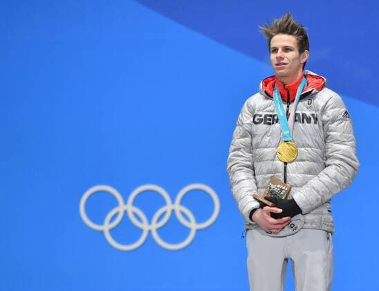 (180211) -- PYEONGCHANG, Feb. 11, 2018 -- Champion Andreas Wellinger of Germany stands on podium during the medal ceremony of men s normal hill individual event of Ski jumping Skispringen Ski nordisch at 2018 PyeongChang Winter Olympic Games Olympische Spiele Olympia OS at the Medal Plaza in PyeongChang, South Korea, on Feb. 11, 2018. ) (SP)OLY-SOUTH KOREA-PYEONGCHANG-SKI JUMPING-MEN S NORMAL HILL INDIVIDUAL-MEDAL CEREMONY LuixSiuxWai 