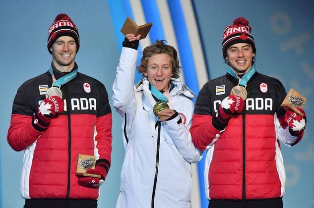 (180211) -- PYEONGCHANG, Feb. 11, 2018 -- Champion Redmond Gerard of the United States (C), second-placed Max Parrot of Canada (L) and third-placed Mark Mcmorris of Canada react during the medal ceremony of men s snowboard slopestyle at the 2018 PyeongChang Winter Olympic Games Olympische Spiele Olympia OS at the Phoenix Snow Park in PyeongChang, South Korea, on Feb. 11, 2018. ) (SP)OLY-SOUTH KOREA-PYEONGCHANG-SNOWBOARD-MEN S SLOPESTYLE-MEDAL CEREMONY LuixSiuxWai 