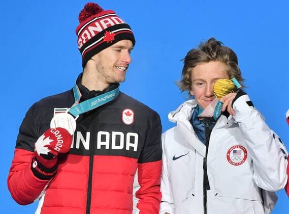 (180211) -- PYEONGCHANG, Feb. 11, 2018 -- Champion Redmond Gerard of the United States (R) and second-placed Max Parrot of Canada react during the medal ceremony of men s snowboard slopestyle at the 2018 PyeongChang Winter Olympic Games Olympische Spiele Olympia OS at the Phoenix Snow Park in PyeongChang, South Korea, on Feb. 11, 2018. ) (SP)OLY-SOUTH KOREA-PYEONGCHANG-SNOWBOARD-MEN S SLOPESTYLE-MEDAL CEREMONY LuixSiuxWai 