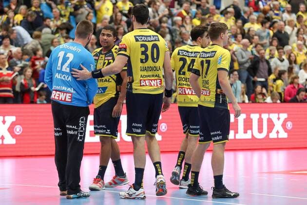 Players of the Rhine Neckar Lions disappointed about the defeat disappointment after the final whistle loser lost frustration disappointed pessimistic handball Champions League Rhein Neckar Löwen MOL Pick Szeged xozx