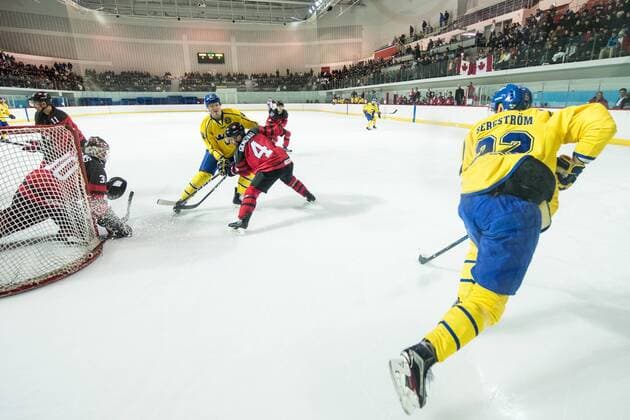 180212 Carl Klingberg of Sweden and Alexander Bergstrom of Sweden worrier against Goaltender Ben Scrivens of Canada during the Men s Ice Hockey International Friendly match between Australia and Canada during day three of the 2018 Winter Olympics on February 12 2018 in Incheon Photo Petter Arvidson BILDBYRAN code PA 91961  Copyright: PETTERxARVIDSON BB180212PA029