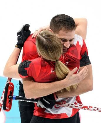 (180212) -- PYEONGCHANG, Feb. 12, 2018 -- Canada s Kaitlyn Lawes (Front) and John Morris celebrate after winning the curling mixed doubles semifinal against Kristin Skaslien and Magnus Nedregotten from Norway at the 2018 PyeongChang Winter Olympic Games Olympische Spiele Olympia OS at the Gangneung Curling Centre in Gangneung, South Korea, on Feb. 12, 2018. Canada won 8-4. ) (SP)OLY-SOUTH KOREA-PYEONGCHANG-CURLING-MIXED DOUBLES-CAN VS NOR MaxPing 