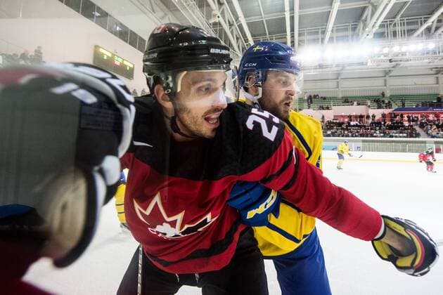 180212 Maxim Lapierre of Canada and Michael Wafi of Sweden during the Men s Ice Hockey International Friendly match between Australia and Canada during day three of the 2018 Winter Olympics on February 12 2018 in Incheon Photo Petter Arvidson BILDBYRAN code PA 91961  Copyright: PETTERxARVIDSON BB180212PA069
