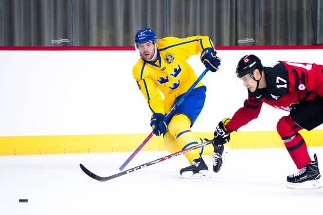 180212 Patrik Hersley of Sweden and Rene Bourque of Canada during the Men s Ice Hockey International Friendly match between Australia and Canada during day three of the 2018 Winter Olympics on February 12 2018 in Incheon Photo Petter Arvidson BILDBYR N code PA 91961  Copyright: PETTERxARVIDSON BB180212PA084