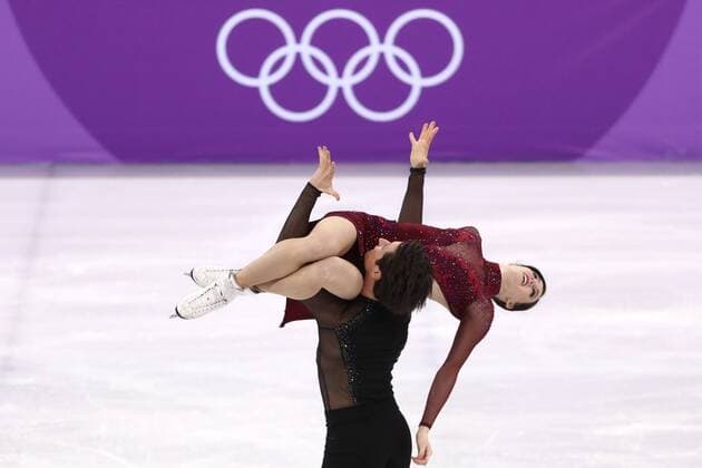 GANGNEUNG, SOUTH KOREA â€“ FEBRUARY 12, 2018: Ice dancers Tessa Virtue and Scott Moir of Canada perform their free dance as part of the Figure skating Eiskunstlauf team event at the 2018 Winter Olympic Games Olympische Spiele Olympia OS at the Gangneung Ice Arena. Valery Sharifulin TASS  TS073693