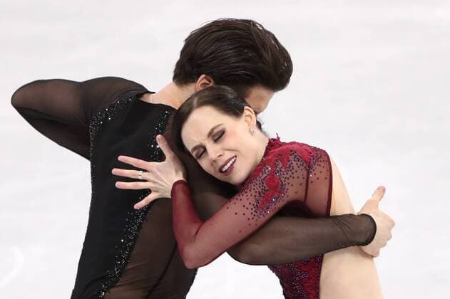 GANGNEUNG, SOUTH KOREA â€“ FEBRUARY 12, 2018: Ice dancers Tessa Virtue and Scott Moir of Canada perform their free dance as part of the Figure skating Eiskunstlauf team event at the 2018 Winter Olympic Games Olympische Spiele Olympia OS at the Gangneung Ice Arena. Valery Sharifulin TASS  TS073696