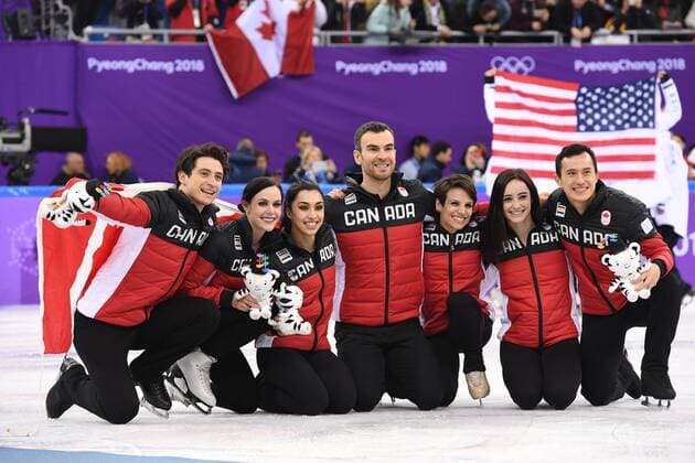 (180212) -- PYEONGCHANG, Feb. 12, 2018 -- Team Canada celebrate after winning the Figure skating Eiskunstlauf team event at the 2018 PyeongChang Winter Olympic Games Olympische Spiele Olympia OS in Gangneung Ice Arena, South Korea, on Feb. 12, 2018. Canada won the gold medal with 73 points in total. ) (SP)OLY-SOUTH KOREA-PYEONGCHANG-FIGURE SKATING-TEAM EVENT WangxSong 
