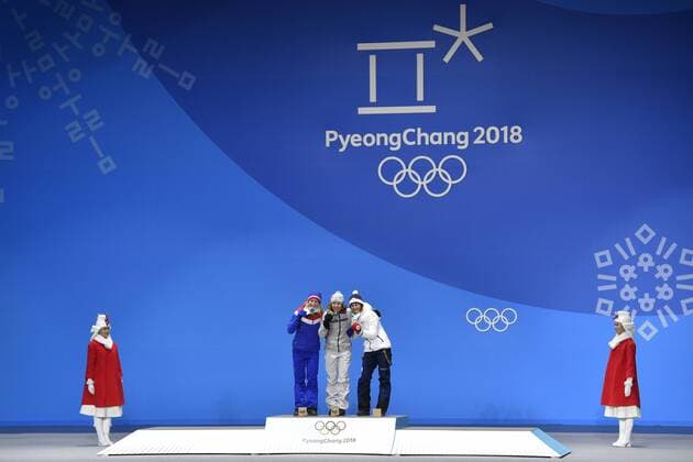 L-R Norwegian biathlete Marte Olsbu (silver medal), German biathlete Laura Dahlmeier (gold medal) and Czech biathlete Veronika Vitkova (bronze medal) are seen during the medal ceremony of biathlon, 7,5 KM, women, within the 2018 Winter Olympics in Pyeongchang, South Korea, February 11, 2018. (CTKxPhoto MichalxKamaryt) CTKPhotoP201802110416101  kmt 10