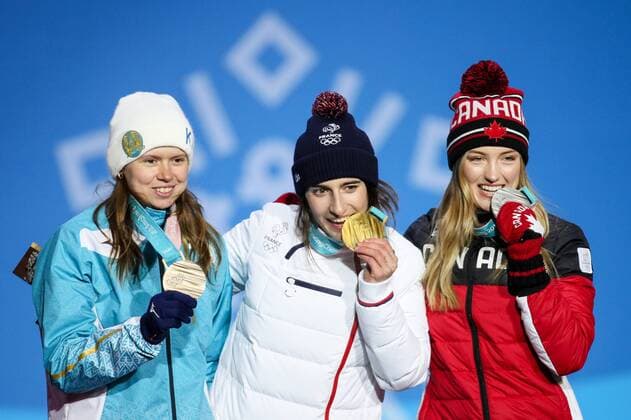 OLYMPICS - 2018 Winter Olympics PYEONGCHANG,SOUTH KOREA,12.FEB.18 - OLYMPICS, FREE SKI, FREESTYLE SKIING - Olympic Winter games Winterspiele Spiele Summer games PyeongChang 2018, Medals Plaza, Moguls, ladies, award ceremony. Image shows Justine Dufour-Lapointe (CAN), Perrine Laffont (FRA) and Yulia Galysheva (KAZ). Keywords: medals. GEPAxpictures xMaticxKlansek
