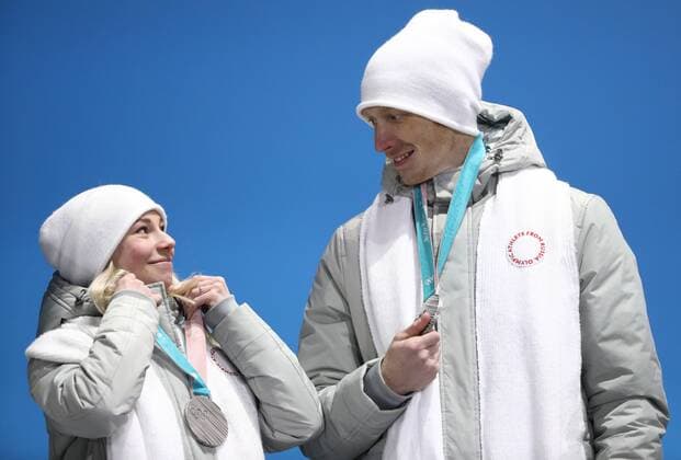 PYEONGCHANG, SOUTH KOREA â€“ FEBRUARY 12, 2018: Olympic Athletes from Russia Yevgenia Tarasova and Vladimir Morozov pose with their silver medals during the victory ceremony for the Figure skating Eiskunstlauf team event at the 2018 Winter Olympic Games Olympische Spiele Olympia OS Valery Sharifulin TASS  TS073775