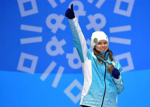 Bronze medalist Kazakstan s Yulia Galysheva celebrates during the medal ceremony for Ladies Moguls during the Pyeongchang 2018 Winter Olympics in Pyeongchang, South Korea, on February 12, 2018.  OLY20180212353 KEVINxDIETSCH