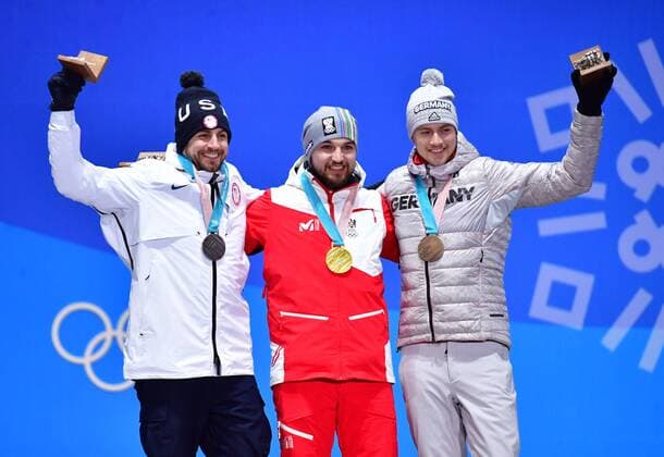 Silver medalist American Chris Mazdzer (L), gold medalist Austria s David Gleirscher and bronze medalist Germany s Johannes Ludwig pose together during the medal ceremony for Men s Luge during the Pyeongchang 2018 Winter Olympics in Pyeongchang, South Korea, on February 12, 2018.  OLY201802123614 KEVINxDIETSCH