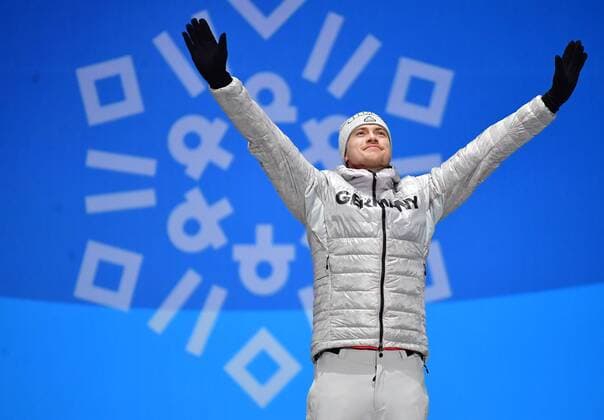 Bronze medalist Germany s Johannes Ludwig celebrates during the medal ceremony for Men s Luge during the Pyeongchang 2018 Winter Olympics in Pyeongchang, South Korea, on February 12, 2018.  OLY20180212364 KEVINxDIETSCH