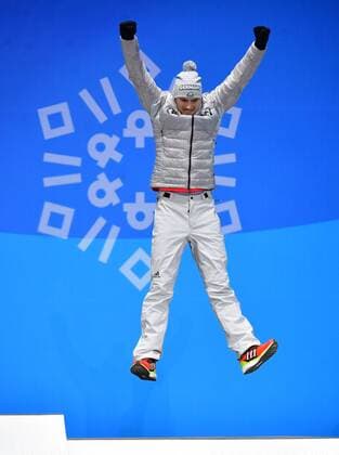 Bronze medalist Germany s Johannes Ludwig celebrates during the medal ceremony for Men s Luge during the Pyeongchang 2018 Winter Olympics in Pyeongchang, South Korea, on February 12, 2018.  OLY20180212365 KEVINxDIETSCH