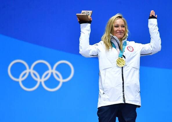 Gold medalist American Jamie Anderson celebrates during the medal ceremony for Ladies Snowboard Slopestyle during the Pyeongchang 2018 Winter Olympics at the Pyeongchang Medals Plaza in Pyeongchang, South Korea, on February 12, 2018.  OLY20180212370 KEVINxDIETSCH