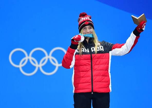 Silver medalist Canada s Lauri Blouin celebrates during the medal ceremony for Ladies Snowboard Slopestyle during the Pyeongchang 2018 Winter Olympics at the Pyeongchang Medals Plaza in Pyeongchang, South Korea, on February 12, 2018.  OLY20180212371 KEVINxDIETSCH