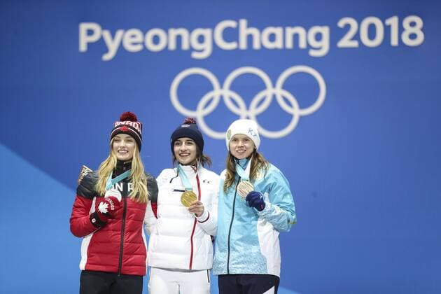 (180212) -- PYEONGCHANG, Feb. 12, 2018 -- Champion Perrine Laffont from France(C), second-placed Justine Dufour-Lapointe from Canada (L) and third-placed Yulia Galysheva from Kazakhstan pose for photos during medal ceremony for ladies moguls event of freestyle skiing at 2018 PyeongChang Winter Olympic Games Olympische Spiele Olympia OS at the Medal Plaza in PyeongChang, South Korea, on Feb. 12, 2018. ) (SP)OLY-SOUTH KOREA-PYEONGCHANG-FREE STYLE SKIING-LADIES MOGULS-MEDAL CEREMONY WuxZhuang 