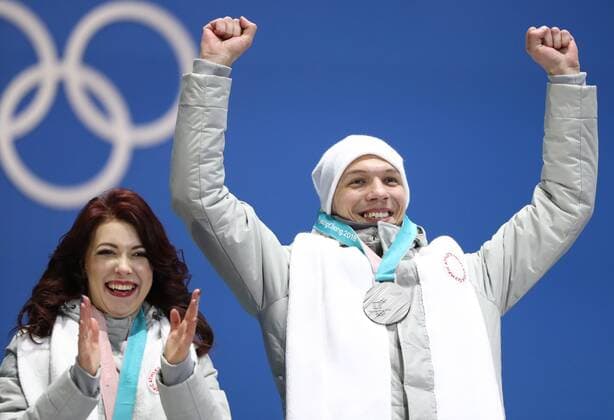 PYEONGCHANG, SOUTH KOREA â€“ FEBRUARY 12, 2018: Olympic Athletes from Russia Ekaterina Bobrova and Dmitri Soloviev pose with their silver medals during the victory ceremony for the Figure skating Eiskunstlauf team event at the 2018 Winter Olympic Games Olympische Spiele Olympia OS Valery Sharifulin TASS  TS0737C3