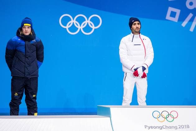 180213 Sebastian Samuelsson of Sweden the silver and Martin Fourcade of France Gold at the medal ceremony for the Men s Biathlon 12 5 km Pursuit during day four of the 2018 Winter Olympics on February 13 2018 in Pyeongchang Photo Jon Olav Nesvold BILDBYRAN code JE 160160  Copyright: JONxOLAVxNESVOLD BB180213JE078