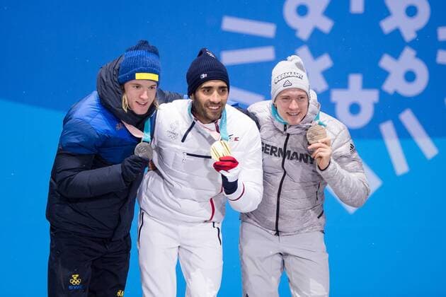 180213 Sebastian Samuelsson of Sweden silver Martin Fourcade of France Gold and Benedikt Doll of Germany Bronze celebrates at the medal ceremony for the Men s Biathlon 12 5 km Pursuit during day four of the 2018 Winter Olympics on February 13 2018 in Pyeongchang Photo Jon Olav Nesvold BILDBYRAN code JE 160160  Copyright: JONxOLAVxNESVOLD BB180213JE089