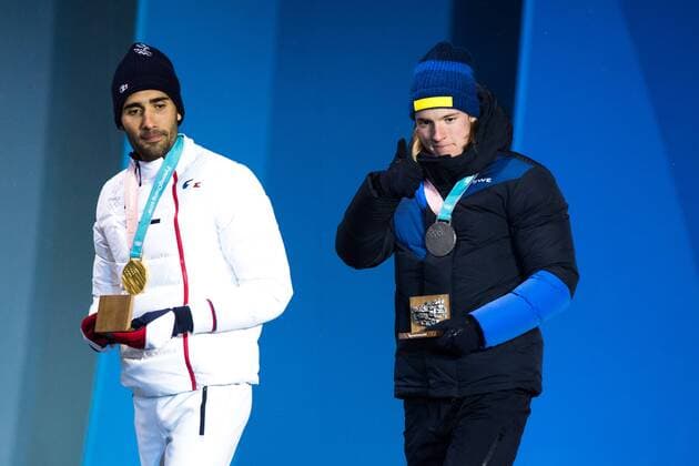 180213 Martin Fourcade of France Gold and Sebastian Samuelsson of Sweden silver at the medal ceremony for the Men s Biathlon 12 5 km Pursuit during day four of the 2018 Winter Olympics on February 13 2018 in Pyeongchang Photo Jon Olav Nesvold BILDBYRAN code JE 160160  Copyright: JONxOLAVxNESVOLD BB180213JE094