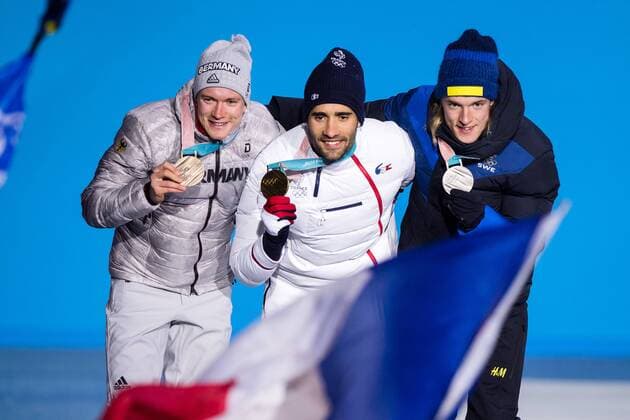 180213 Martin Fourcade of France Gold and Sebastian Samuelsson of Sweden silver at the medal ceremony for the Men s Biathlon 12 5 km Pursuit during day four of the 2018 Winter Olympics on February 13 2018 in Pyeongchang Photo Jon Olav Nesvold BILDBYR N code JE 160160  Copyright: JONxOLAVxNESVOLD BB180213JE098