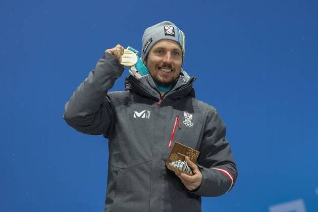 OLYMPICS - 2018 Winter Olympics PYEONGCHANG,SOUTH KOREA.13.FEB.18 - OLYMPICS,ALPINE SKIING - Olympic Winter games Winterspiele Spiele Summer games PyeongChang 2018, alpine combined, men, award ceremony. Image shows Marcel Hirscher (AUT). Keywords: medal. GEPAxpictures xMaticxKlansek