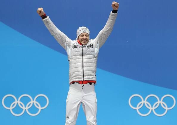 (180213) -- PYEONGCHANG, Feb. 13, 2018 -- Champion Arnd Peiffer from Germany celebrates during the medal ceremony of men s 10km sprint event of biathlon at 2018 PyeongChang Winter Olympic Games Olympische Spiele Olympia OS at the Medal Plaza in PyeongChang, South Korea, on Feb. 13, 2018. ) (SP)OLY-SOUTH KOREA-PYEONGCHANG-BIATHLON-MEN S 10KM SPRINT-MEDAL CEREMONY BaixXuefei 