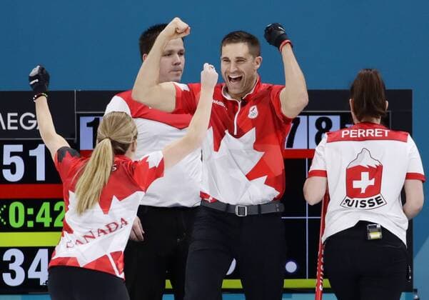 Pyeongchang Olympics Canada s John Morris (2nd from R) and Kaitlyn Lawes (L) celebrate after defeating Switzerland s Jenny Perret and Martin Rios in the curling mixed doubles final of the Pyeongchang Winter Olympics in Gangneung, South Korea, on Feb. 13, 2018. 