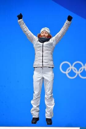 Gold medalist Germany s Laura Dahlmeier celebrates during the medal ceremony for Biathlon Women s 10km Pursuit at the medal s plaza during the Pyeongchang 2018 Winter Olympics in Pyeongchang, South Korea, on February 13, 2018.  OLY20180213375 KEVINxDIETSCH
