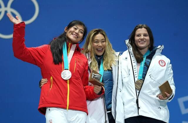 Silver medalist China s Jiayu Liu (L), gold medalist American Chloe Kim and bronze medalist Arielle Gold pose during the medal ceremony for Ladies Snowboard Halfpipe at the medal s plaza during the Pyeongchang 2018 Winter Olympics in Pyeongchang, South Korea, on February 13, 2018.  OLY20180213393 KEVINxDIETSCH