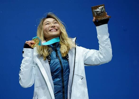 Gold medalist American Chloe Kim celebrates during the medal ceremony for Ladies Snowboard Halfpipe at the medal s plaza during the Pyeongchang 2018 Winter Olympics in Pyeongchang, South Korea, on February 13, 2018.  OLY20180213396 KEVINxDIETSCH