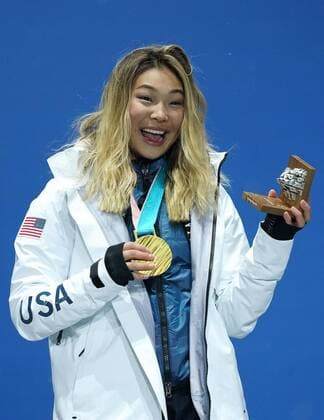 Gold medalist American Chloe Kim celebrates during the medal ceremony for Ladies Snowboard Halfpipe at the medal s plaza during the Pyeongchang 2018 Winter Olympics in Pyeongchang, South Korea, on February 13, 2018.  OLY20180213397 KEVINxDIETSCH