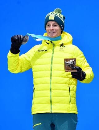 Silver medalist Australia s Matt Graham celebrates during the medal ceremony for Men s Moguls at the medal s plaza during the Pyeongchang 2018 Winter Olympics in Pyeongchang, South Korea, on February 13, 2018.  OLY20180213360 KEVINxDIETSCH
