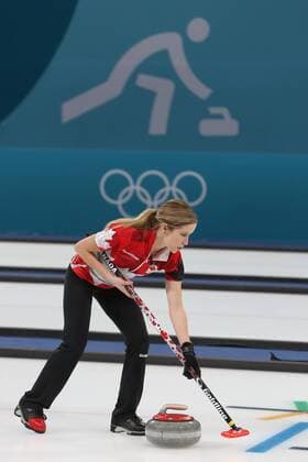 Kaitlyn Lawes of Canada sweeps during the Gold Medal Mixed Doubles game against Switzerland at the Gangneung Curling Center in Gangneung, South Korea during the 2018 Pyeongchang Winter Olympics on February 13, 2018. Canada won 10-3.  OLY20180213816 ANDREWxWONG