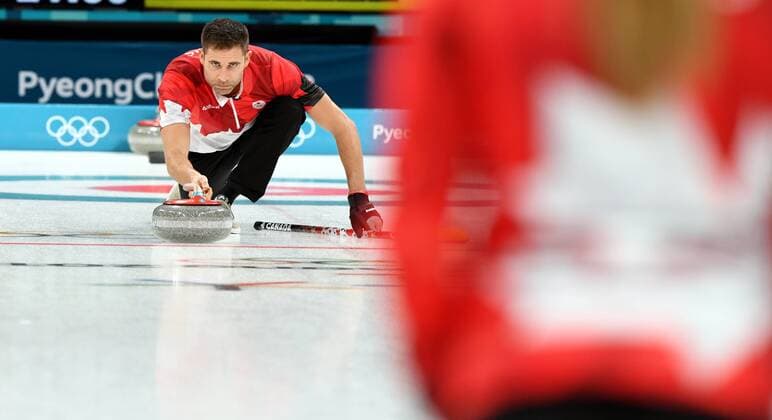 (180213) -- PYEONGCHANG, Feb. 13, 2018 -- John Morris of Canada competes during the mixed doubles gold medal game of curling between Canada and Switzerland at the Pyeongchang 2018 Winter Olympic Games Olympische Spiele Olympia OS at Gangneung Curling Centre?Gangneung, South Korea, Feb. 13, 2018. Canada won 10:3. ) (SP)OLY-SOUTH KOREA-PYEONGCHANG-CURLING-MIXED DOULBES-GOLD MEDAL GAME MaxPing 