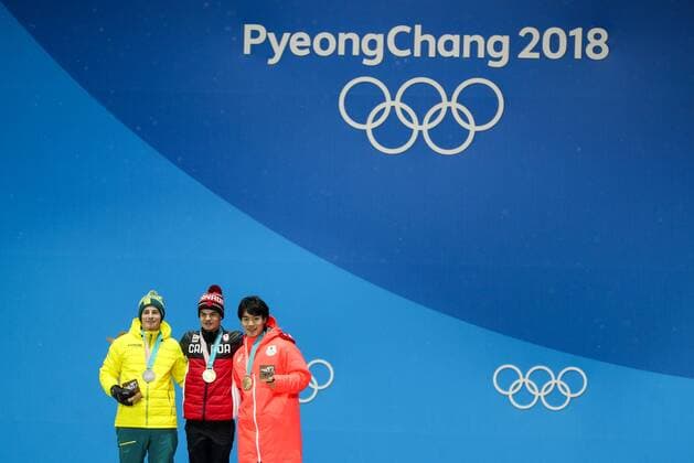 OLYMPICS - 2018 Winter Olympics PYEONGCHANG,SOUTH KOREA,13.FEB.18 - OLYMPICS, FREE SKI, FREESTYLE SKIING - Olympic Winter games Winterspiele Spiele Summer games PyeongChang 2018, Medals Plaza, Moguls, Men, award ceremony. Image shows Matt Graham (AUS), Mikael Kingsbury (CAN) and Daichi Hara (JPN). Keywords: medals. GEPAxpictures xMaticxKlansek