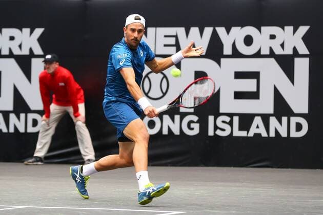 UNIONDALE, NY - FEBRUARY 13: Steve Johnson of the United States returns during the New York Open on February 13, 2018, at NYCB Live in Uniondale, NY. (Photo by Rich Graessle Icon Sportswire) TENNIS: FEB 13 New York Open Icon0213181492 EDITORIAL USE ONLY