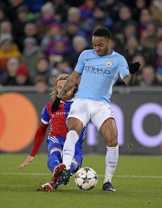 13 02 2018 football UEFA Champions League 2017 2018 knockout FC Basel Manchester City in the St Jakobs Park Stadium in Basel Switzerland Michel lang FC Basel against Raheem Sterling Manchester City